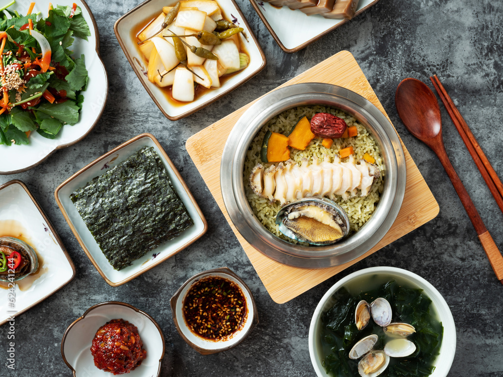 Korean traditional food, various side dishes and abalone pot rice Stock ...