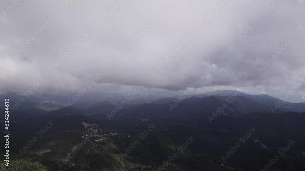 fascinating video shot flying over the area of the Bracco pass in italy among the high clouds fascinating video shot flying over the area of the Bracco pass in italy among the high clouds