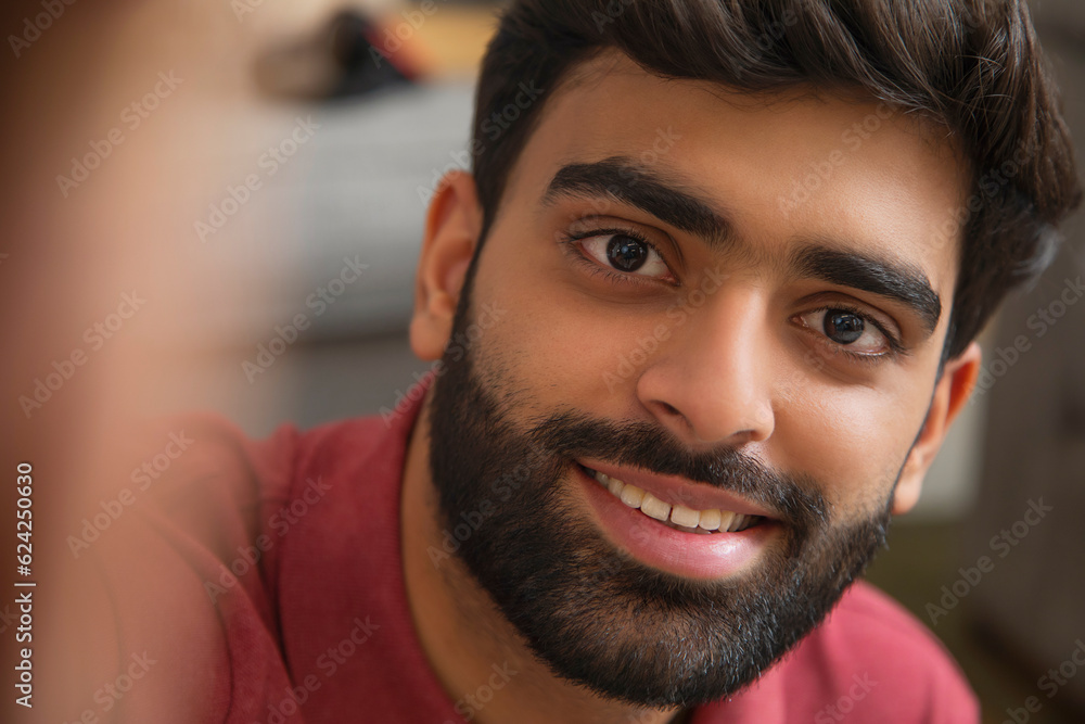 Fototapeta premium Close-up portrait of handsome young man with beard