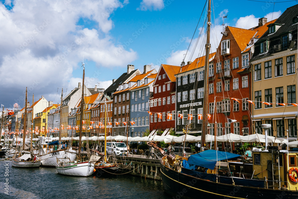 Boats and colorful buildings of Nyhavn in Copenhagen, Denmark
