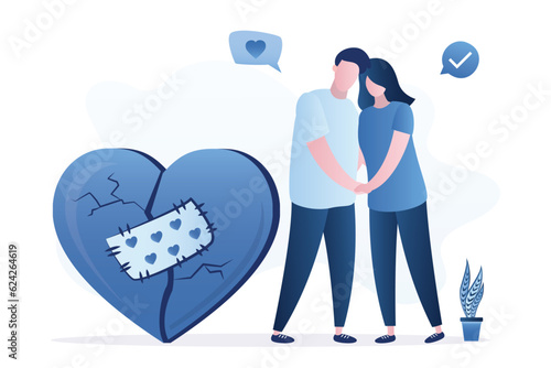 Love couple standing near broken heart with sew patch. Reconciliation concept. Married couple reconciled, heart with scratches and cracks isolated on white. Restore love.