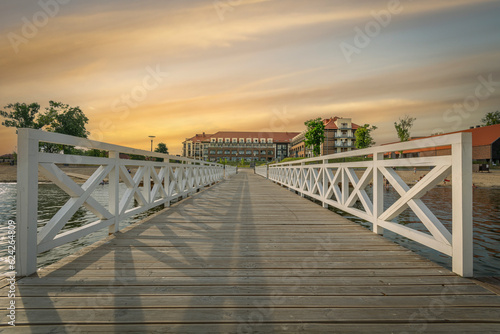 The boulevard on Lake Drweckie in Ostroda is a tourist landmark of the city, Poland. photo