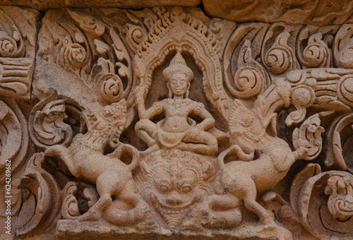 Beautiful shiva sculpture on monster lion head of sandstone lintel of Phanom rung castle