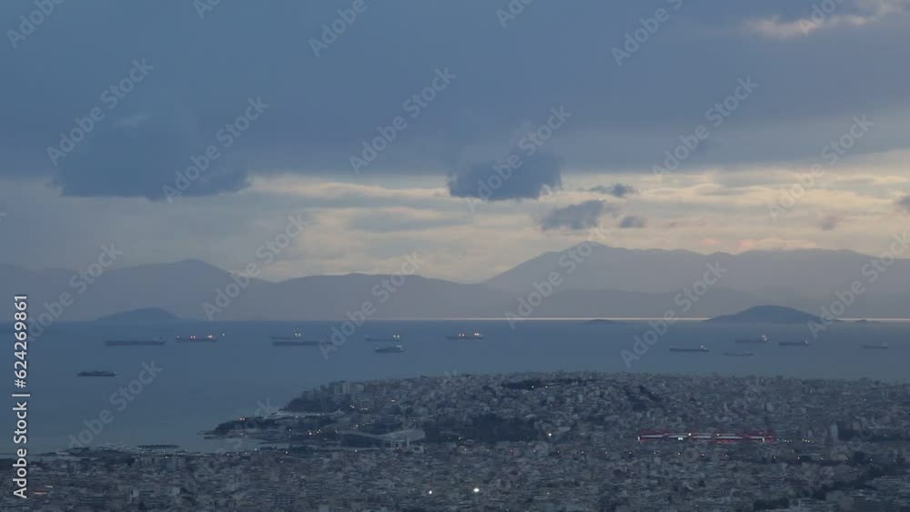 View of Athens, Aegina island and peloponnese from Lycabettus hill at sunset, Greece.
View of Athens, Aegina island and peloponnese from Lycabettus hill at sunset, Greece.