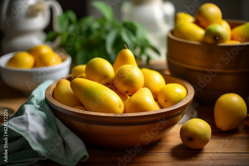 A bowl full of mangoes on a wooden kitchen counter. Nicely lit scene  boho style surroundings with accessories around