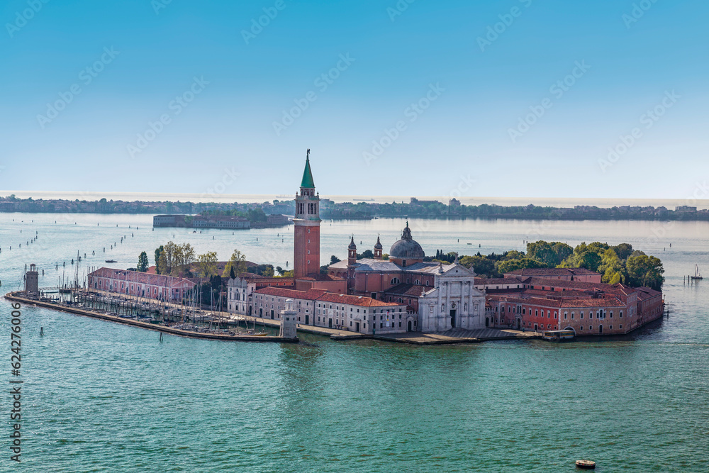 View from the bell tower of San Marco on the island of San Giorgio Maggiore with the basilica of the same name on it in the Venetian Lagoon. Venice, Italy