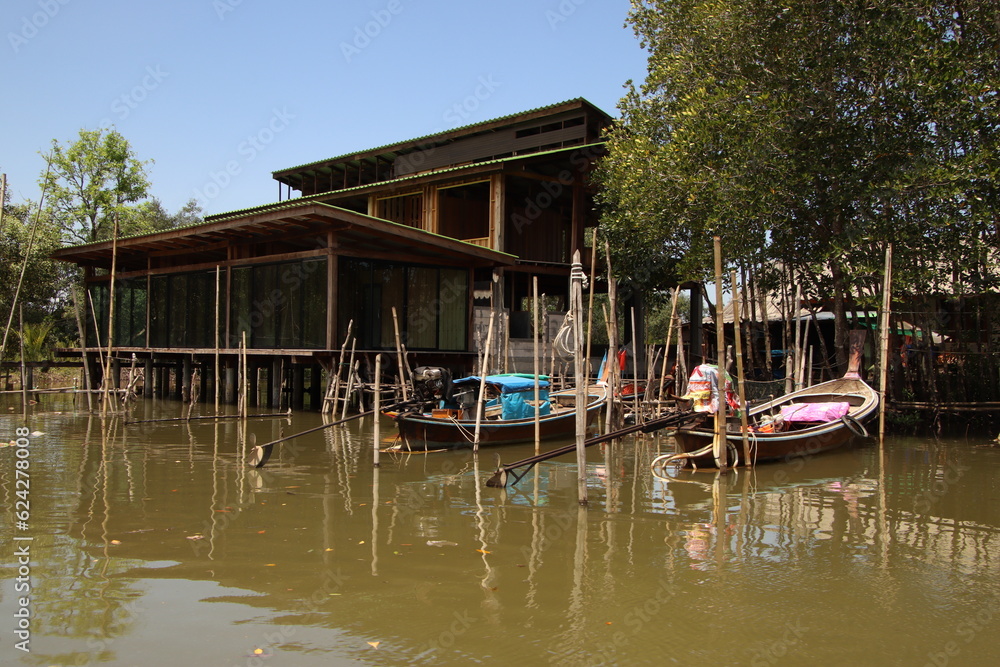 small houses at a river in Thailand small houses at a river in Thailand