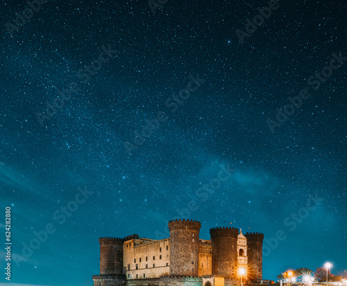 Naples, Italy. Castel Nuovo Often Called Maschio Angioino In Evening Or Night Illuminations. photo