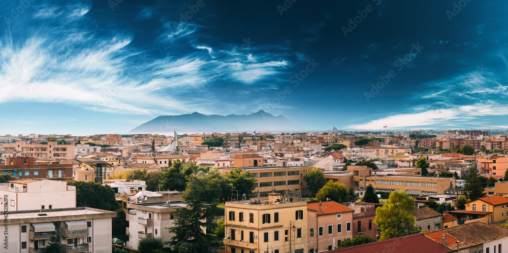Fototapeta premium Terracina, Italy. Skyline View Of Terracina With Circeo Promontory And Tyrrhenian Sea In Background. Panorama. Panoramic View