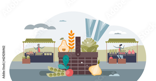Reducing carbon footprint through daily food choices tiny person concept, transparent background. Eat healthy and buy local vegetables, roots, fruits and berries from farmers market illustration.