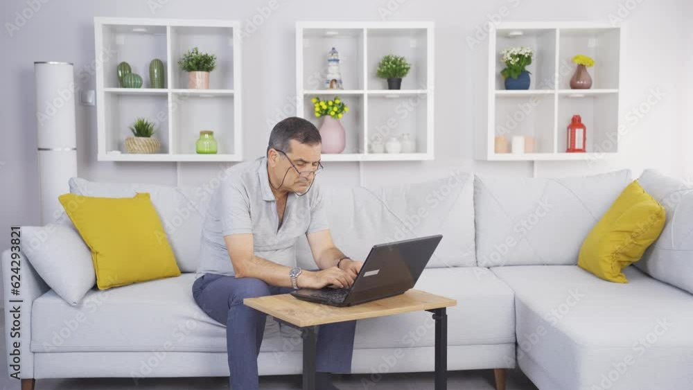 Old man chatting online on laptop. Old man spending his free time. Old man chatting online on laptop. Old man spending his free time.