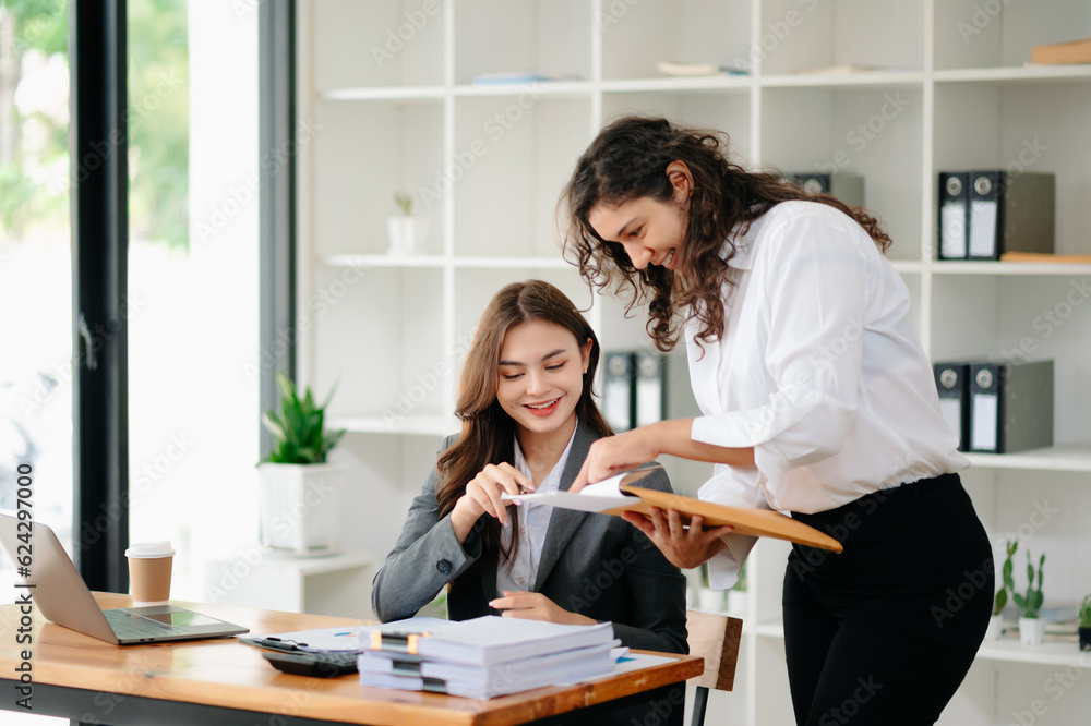 Portrait of success business people working together in home office. Couple teamwork startup concept. Portrait of success business people working together in home office. Couple teamwork startup concept.
