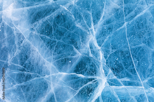 Konstfotografi Beautiful winter natural blue ice texture of surface of frozen Baikal Lake in cold day