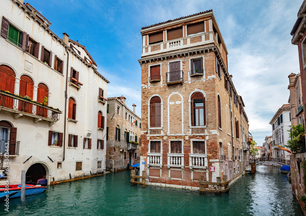 Floating house on canal in Venice, Italy
