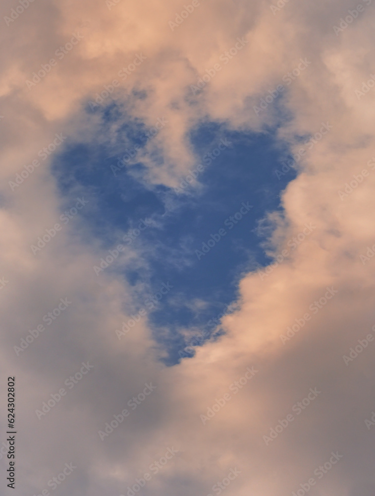 Dramatic Sky with Clouds in Heart Shape