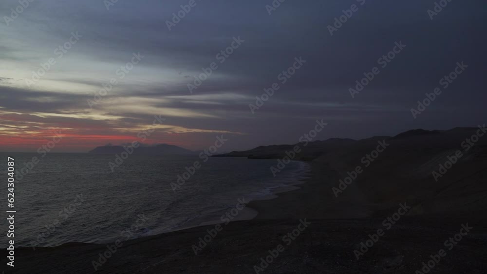 sunset with golden light over the paracas, Peru.