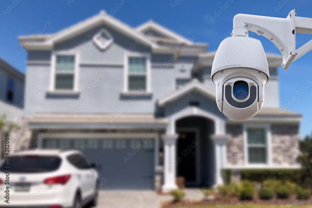 Security camera and private house on the background. Security camera and private house on the background.