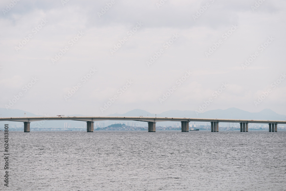 Jimei Bridge and the Ocean on a Cloudy Day in Xiamen, Fujian Province, China