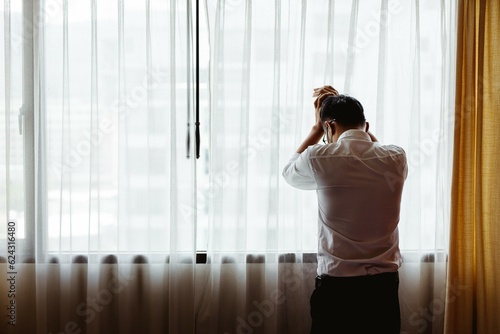 Sad young man in the bedroom, People with depression concept. Free Download Sad young man in the bedroom, People with depression concept. - GFXLoad