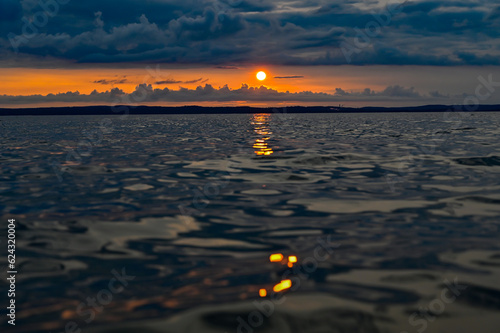 Sunset and clouds over lake Vattern Motala Sweden