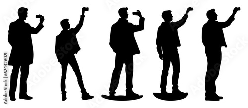silhouette man recording, streaming, taking photo using cell phone
