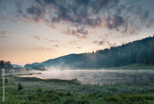 Wallpaper Mural lever de soleil et brume matinale sur le lac de Lamoura dans le Haut Jura en France Torontodigital.ca