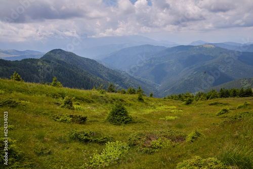 Beautiful mountains landscape in summer. Carpathians mountains in Romania. Baiului Mountains trails.