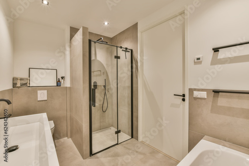 a modern bathroom with shower, toilet and bathtub in the background is an open door to a walk - in shower