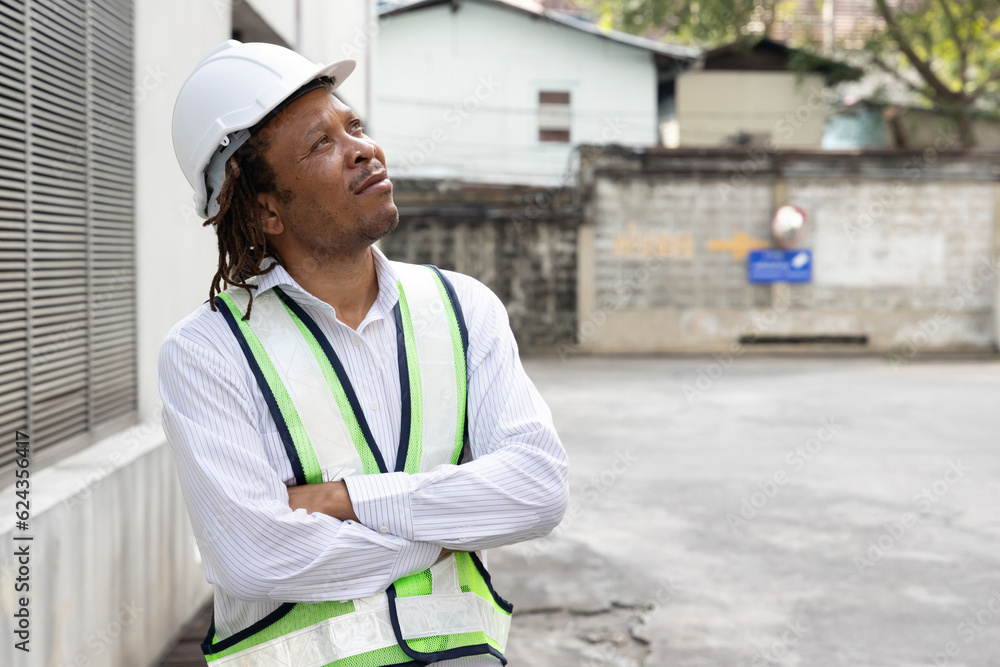 African Engineer man Looking up Gesture, Guiding Vision of Success in Construction Project African Engineer man Looking up Gesture, Guiding Vision of Success in Construction Project