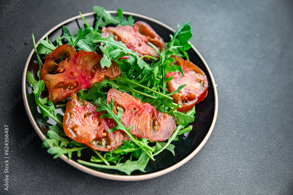 red tomato salad arugula healthy meal food snack on the table copy space food background rustic top view red tomato salad arugula healthy meal food snack on the table copy space food background rustic top view