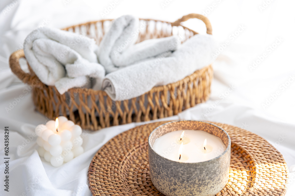 Spa composition with candles on a blurred background. Spa composition with candles on a blurred background.