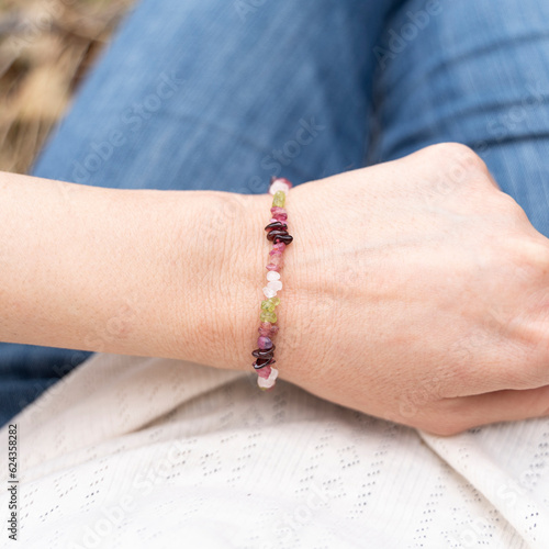 Obraz na płótnie Gemstone tiny beaded bracelet. Energy crystals, healing stone jewelry. Handmade accessories.
Citrine, Garnet, Peridot. w salonie