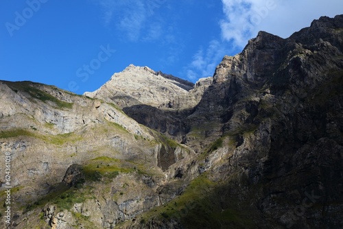 Dramatic mountain view from Cirque de Gavarnie mountain valley in Pyrenees National Park in France. © Tupungato