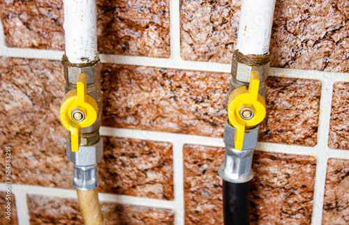 Old taps, valves for shutting off gas pipes. photo