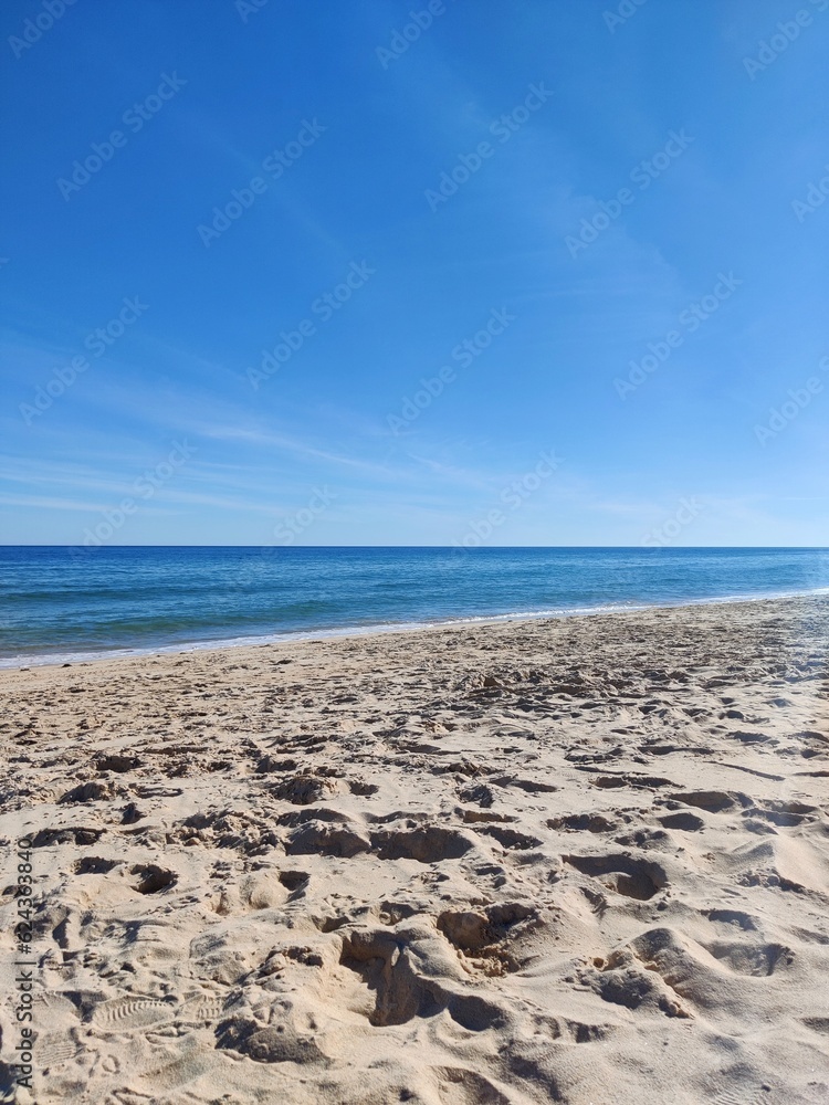 sand beach, blue sky and sea