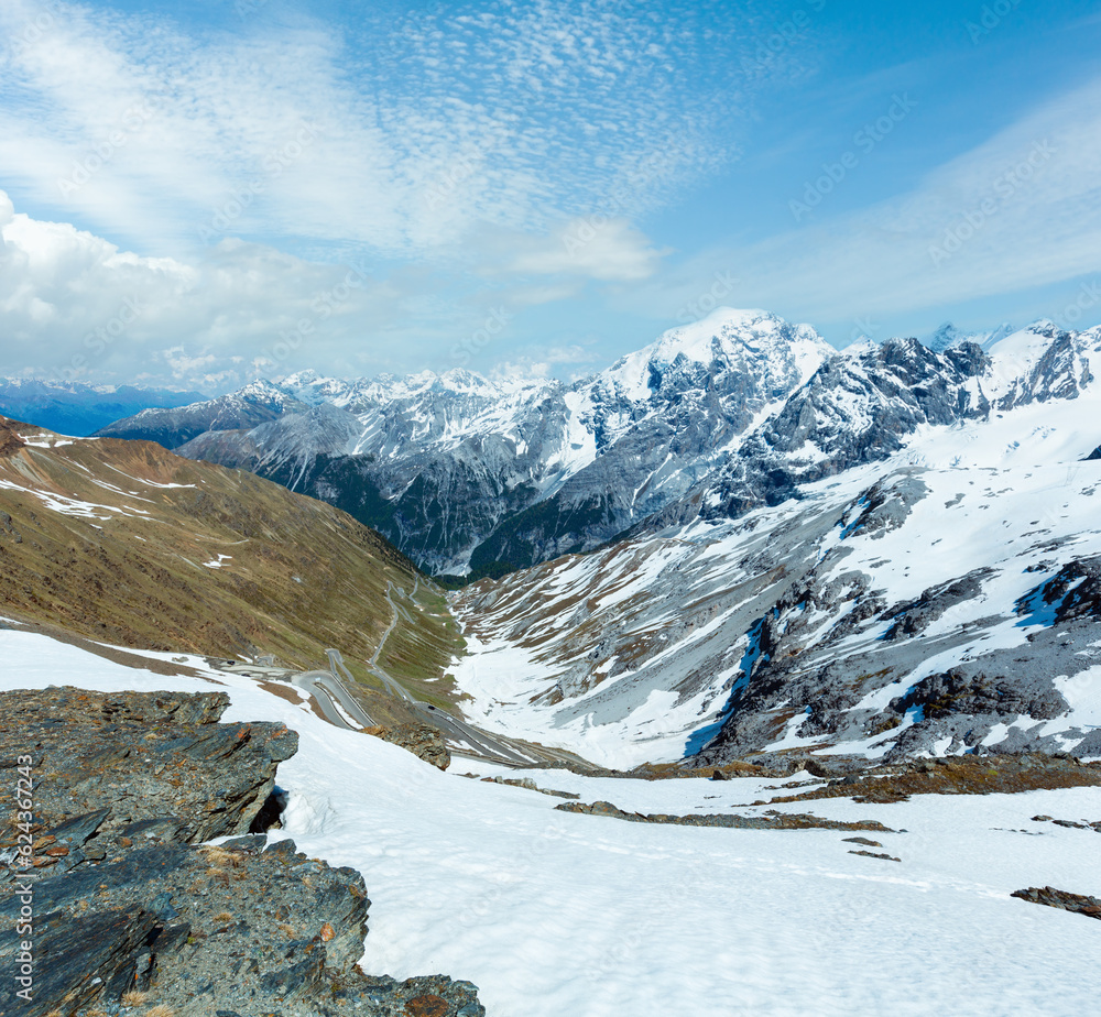 Naklejka premium Summer Stelvio pass with alpine road and snow on slope (Italy)