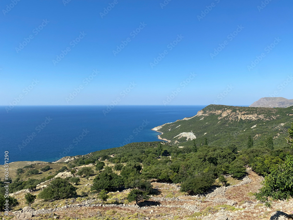 Gokceada (Imbros) coastline seashore view with Samothrace Greek island at background. Tepeköy village, Çınaraltı-Pinarbasi location, Aegean Turkey