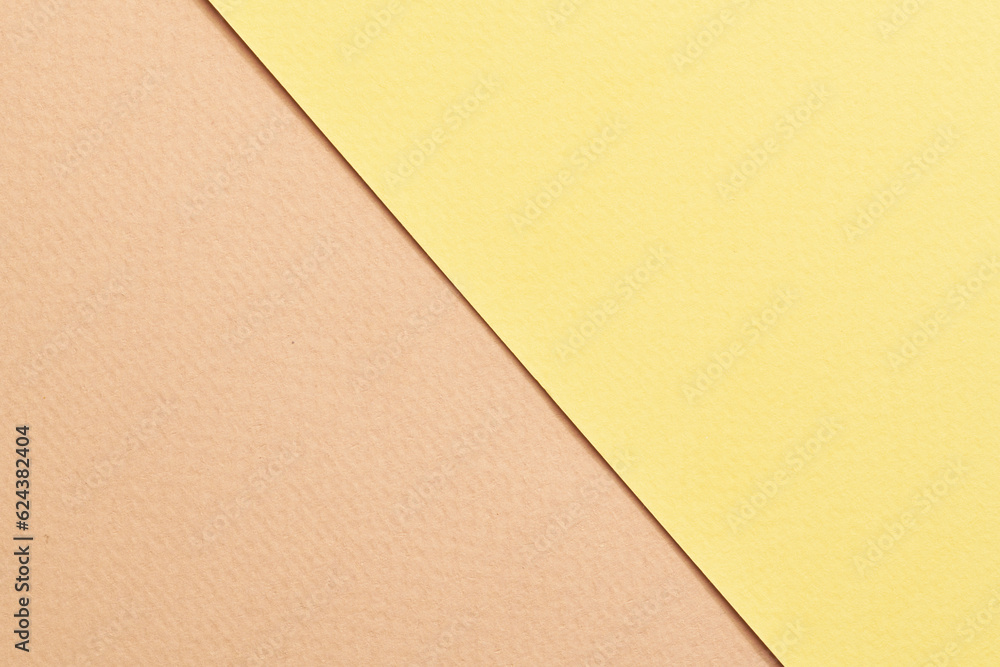 Rough kraft paper background, paper texture beige yellow colors. Mockup with copy space for text. Rough kraft paper background, paper texture beige yellow colors. Mockup with copy space for text.