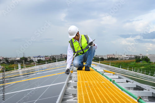 Engineer Inspector Quality in Solar Roof Panel Installation, Sustainable Photovoltaic Work for Factory Buildings. Natural Energy Sources Infrastructure Development in Efficiency.