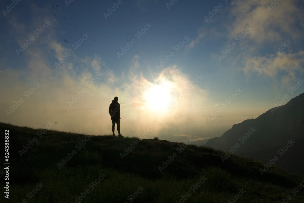 silhouette of a person in the mountains, Tiganesti Mountain, Bucegi Mountains, Romania 
