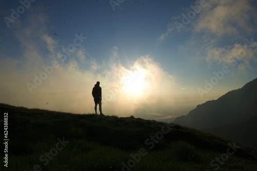 silhouette of a person in the mountains, Tiganesti Mountain, Bucegi Mountains, Romania 
