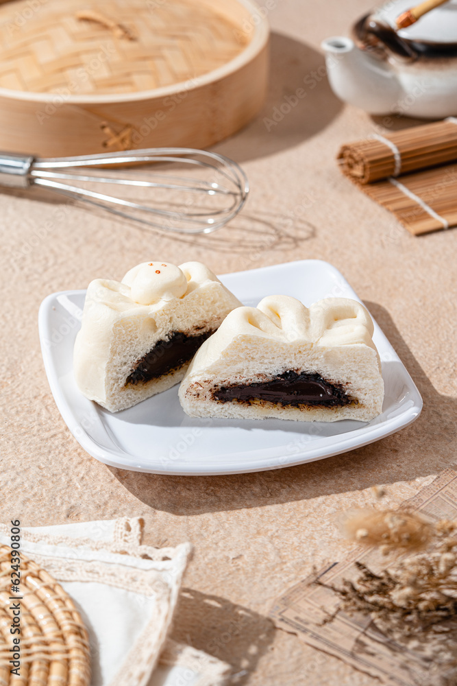 Baozi or Bakpao is a type of yeast-leavened filled bun in various Chinese cuisines.