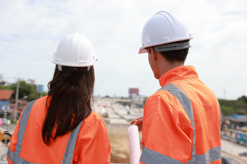 Surveyor site engineer with total positioning station on the construction site of the new road construction. Surveyor site engineer with total positioning station on the construction site of the new road construction.