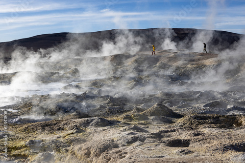 Stunning geothermic field of Sol de Ma  ana with its steaming geysers and hot pools with bubbling mud - just one sight on the lagoon route in Bolivia  South America