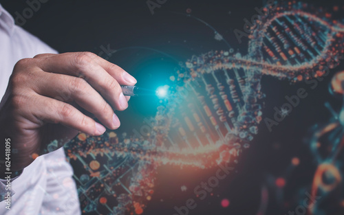 Finger touching DNA, genetically modified DNA, black background concept in invention. Developing genetically modified human genes