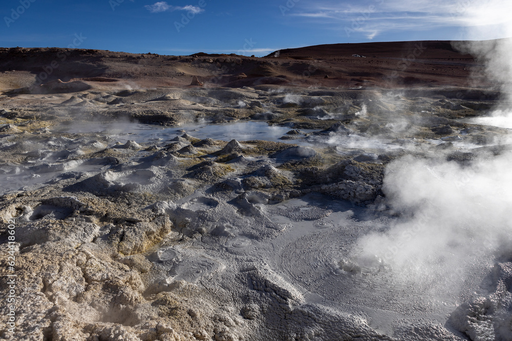 Stunning geothermic field of Sol de Mañana with its steaming geysers and hot pools with bubbling mud - just one sight on the lagoon route in Bolivia, South America Stunning geothermic field of Sol de Mañana with its steaming geysers and hot pools with bubbling mud - just one sight on the lagoon route in Bolivia, South America