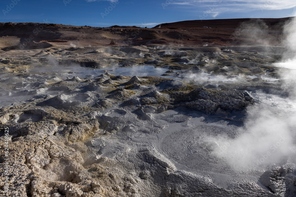 Stunning geothermic field of Sol de Mañana with its steaming geysers and hot pools with bubbling mud - just one sight on the lagoon route in Bolivia, South America