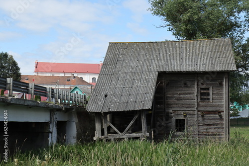 Wooden water mill of the late 19th century on the Olshanka River in Golshany, Belarus photo