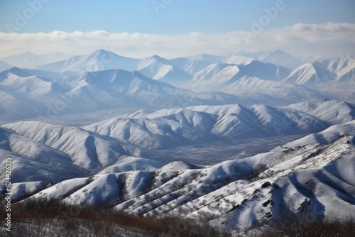 snow-covered mountain range, with peaks and valleys visible in the distance, created with generative ai