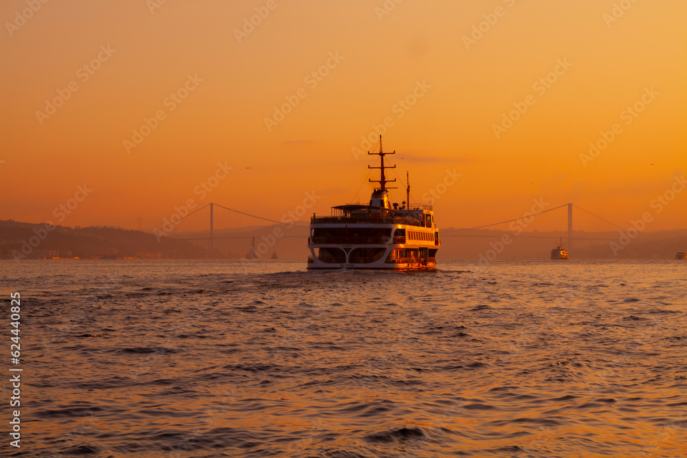 Awesome Panoramic view of Istanbul Bosphorus on sunset. Istanbul Bosphorus Bridge (15 July Martyrs Bridge. Turkish: 15 Temmuz Sehitler Koprusu). Beautiful landscape Turkey.